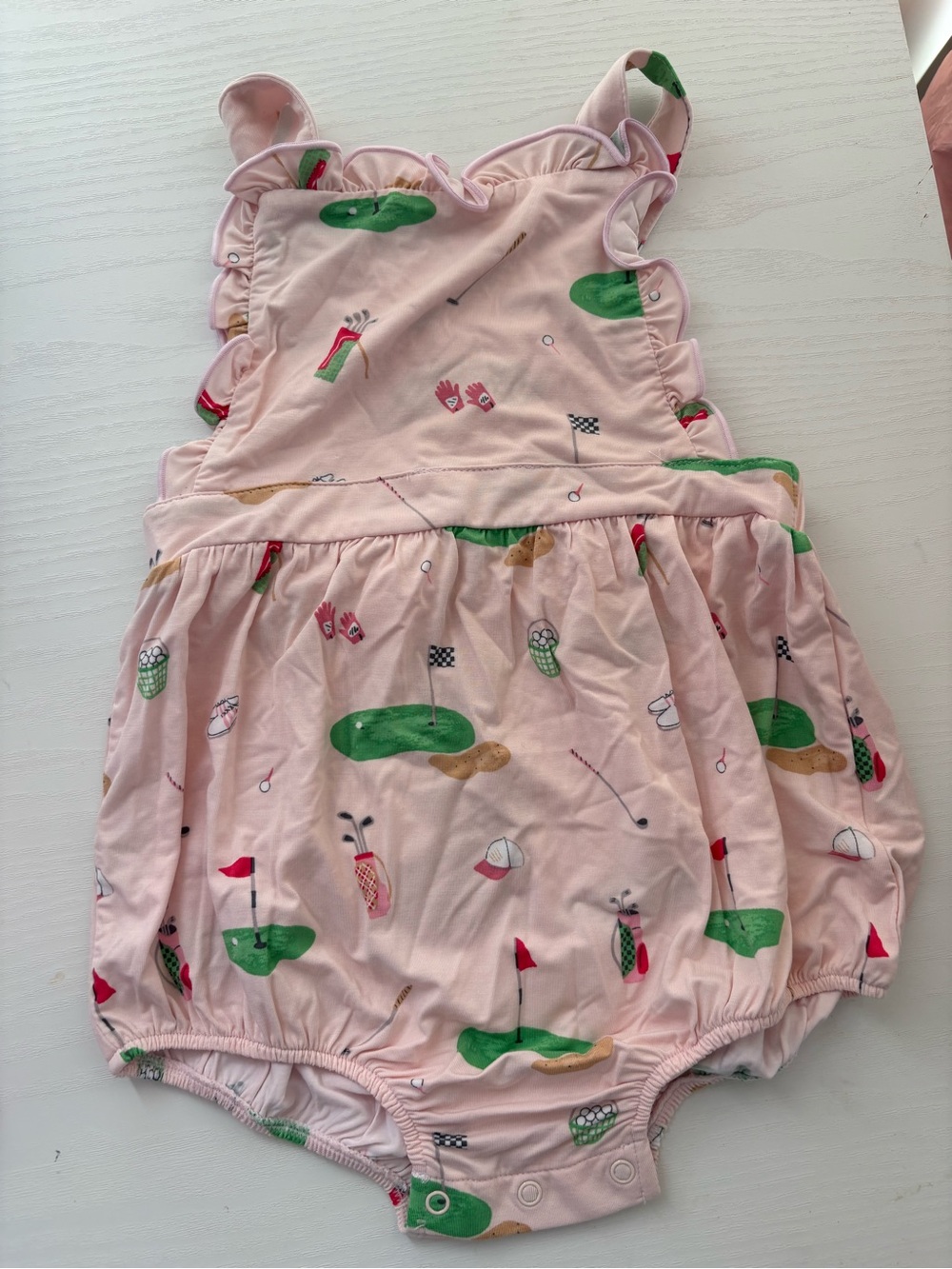 Girls Pink Golf Print Ruffle Sunsuit